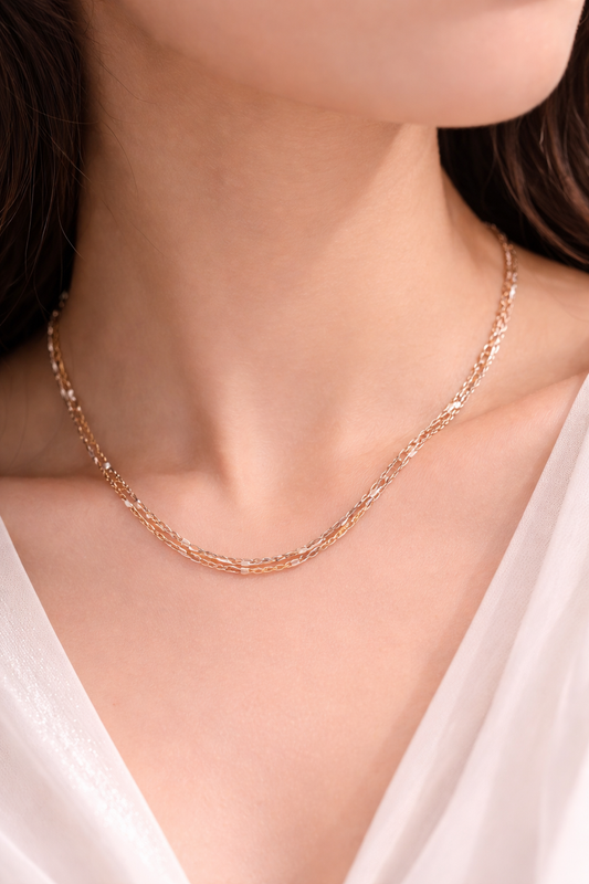 Sivorae tri tone designer chain necklace worn by woman, rose gold silver yellow gold elegant 18 inch adjustable chain